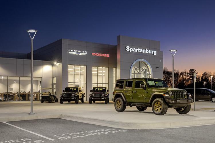 Jeep dealership lot lit with commercial outdoor lighting